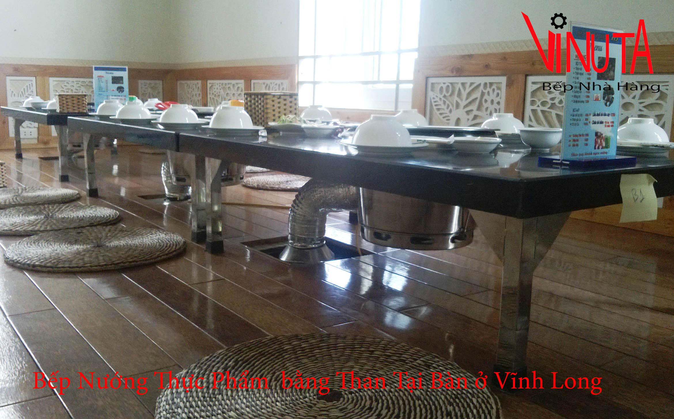 bếp nướng thực phẩm bằng than tại bàn ở Vĩnh Long