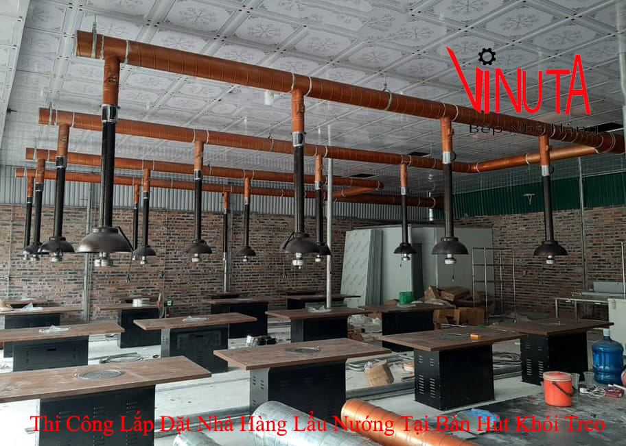 thi công lắp đặt nhà hàng lẩu nướng tại bàn hút khói treo